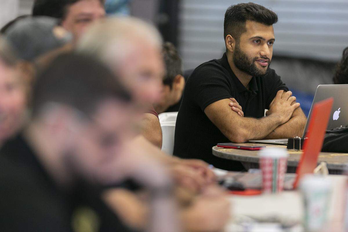 Amir Panjwani, 26, attends a free meetup group for Amazon resellers in Miami on Saturday, December 15, 2018. The free Meetup aims to teach members how to successfully launch and sustain a business selling items on Amazon.