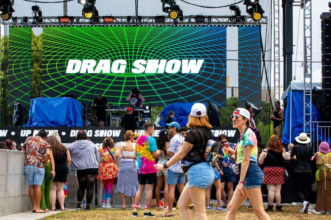 Festival goers wait for the start of a drag show at the Cosmic mainstage during Wynwood Pride music festival in Miami, Florida, on Saturday, June 11, 2022.