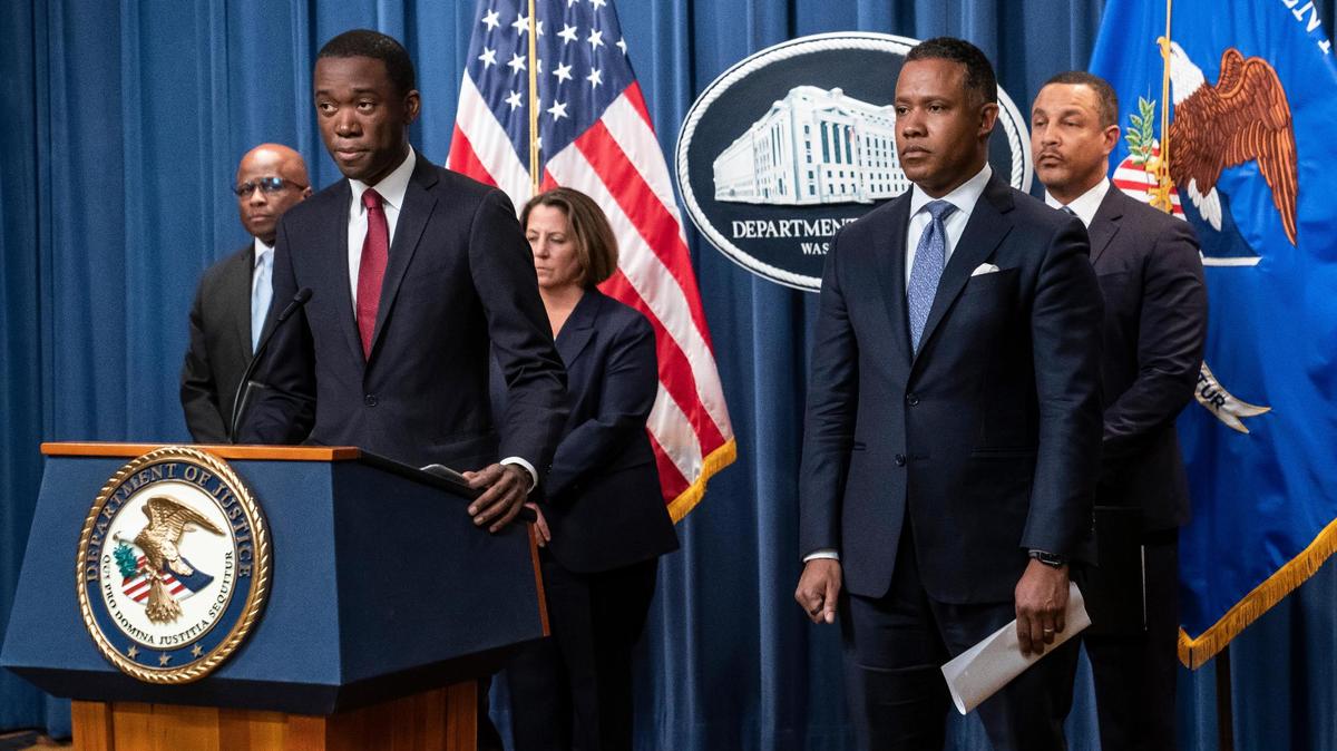 Deputy Treasury Secretary Wally Adeyemo speaks alongside from left, Brian C. Turner, FBI associate deputy director, Deputy Attorney General Lisa Monaco, Assistant Attorney General Kenneth Polite Jr., and U.S. Attorney for the Eastern District of New York, Breon Peace, while announcing international enforcement action against cryptocurrency exchange Bitzlato and the arrest of the company’s founder, Russian national Anatoly Legkodymov, during a news conference at the Justice Department, Wednesday, Jan. 18, 2023, in Washington. (AP Photo/Nathan Howard)