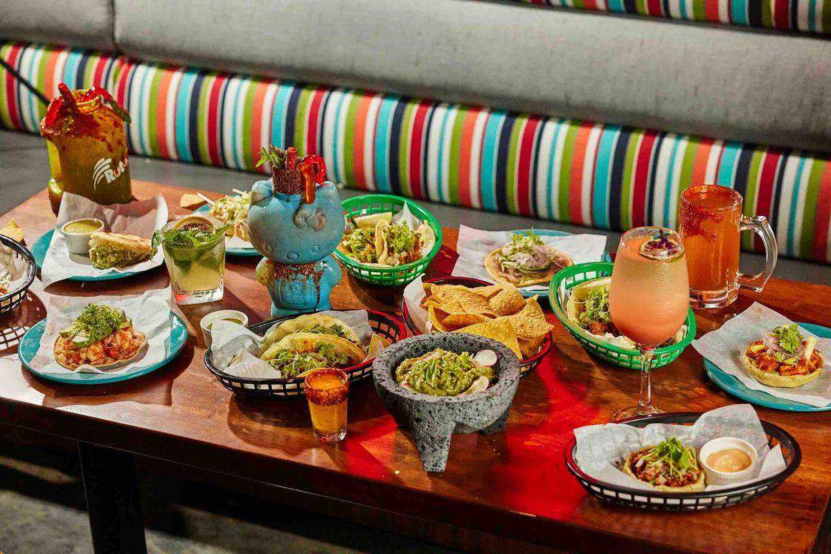 The Whiskylucan menu includes tacos, tostadas, tortas, guacamole — and craft cocktails.