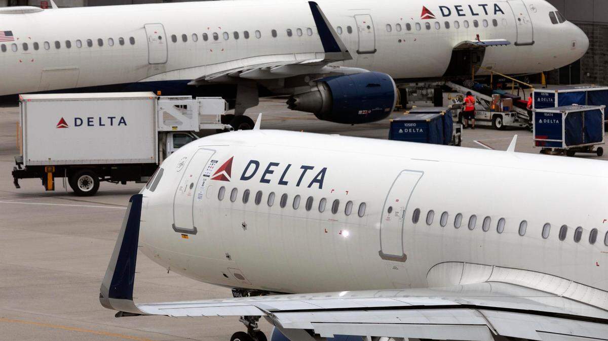 Delta Air Lines plane leaves the gate, Monday, July 12, 2021, at Logan International Airport in Boston. (AP Photo/Michael Dwyer)
