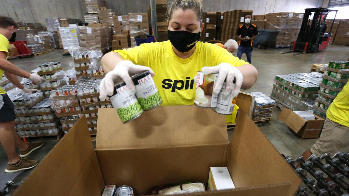 Cars line up for hours at the food pantry. How the pandemic ravaged South Florida