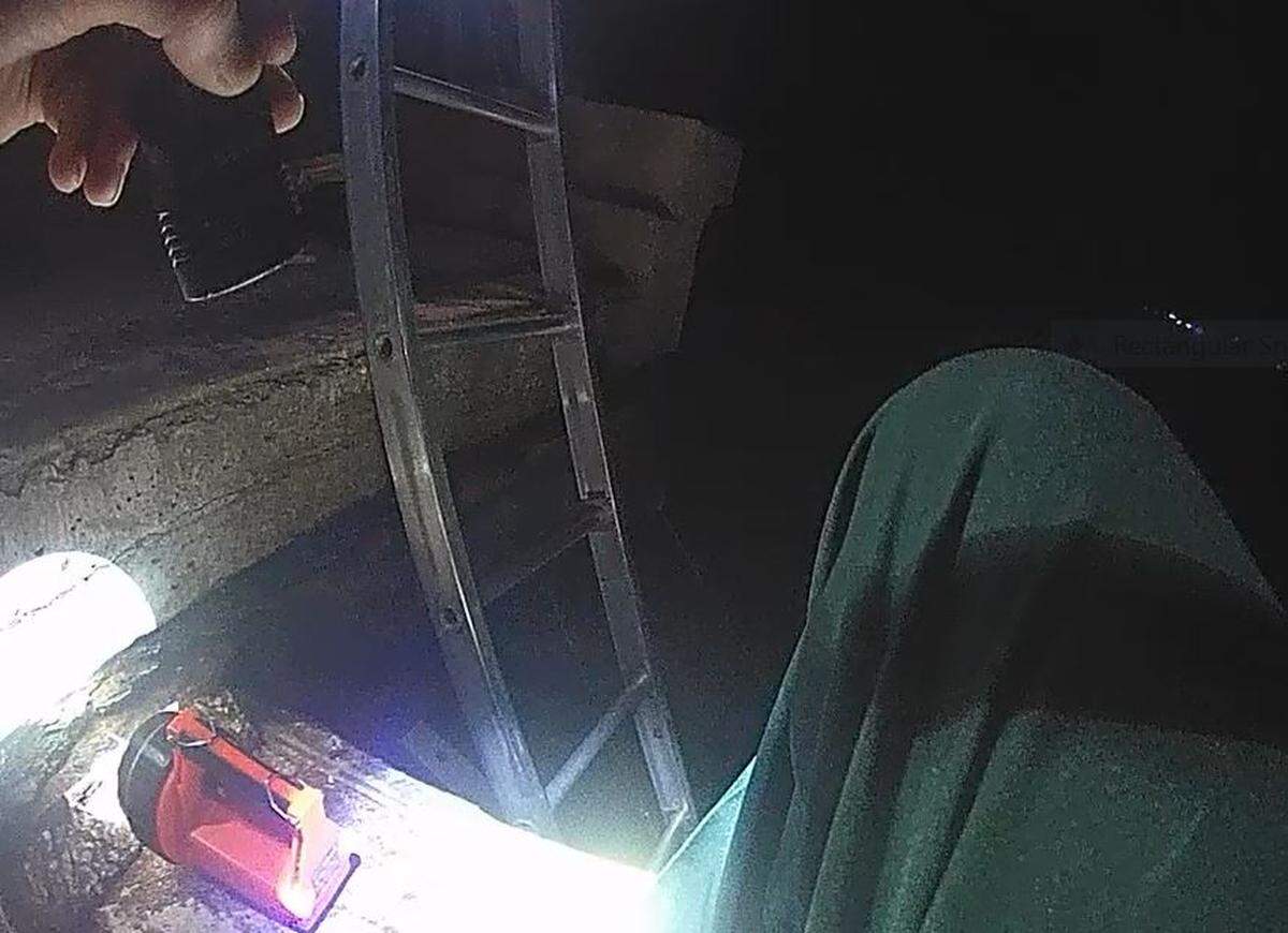 Monroe County Fire Rescue medics and sheriff’s office deputies place a ladder from atop the South Pine Channel Bridge to a boat that crashed into the bridge Monday, July 8, 2024.
