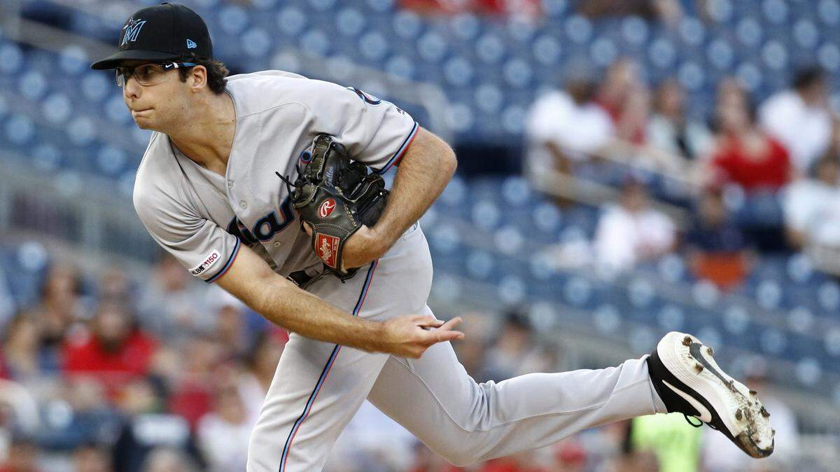 Miami Marlins starting pitcher Zac Gallen follows through on a pitch to the Washington Nationals in the first inning of a baseball game, Tuesday, July 2, 2019, in Washington. (AP Photo/Patrick Semansky)