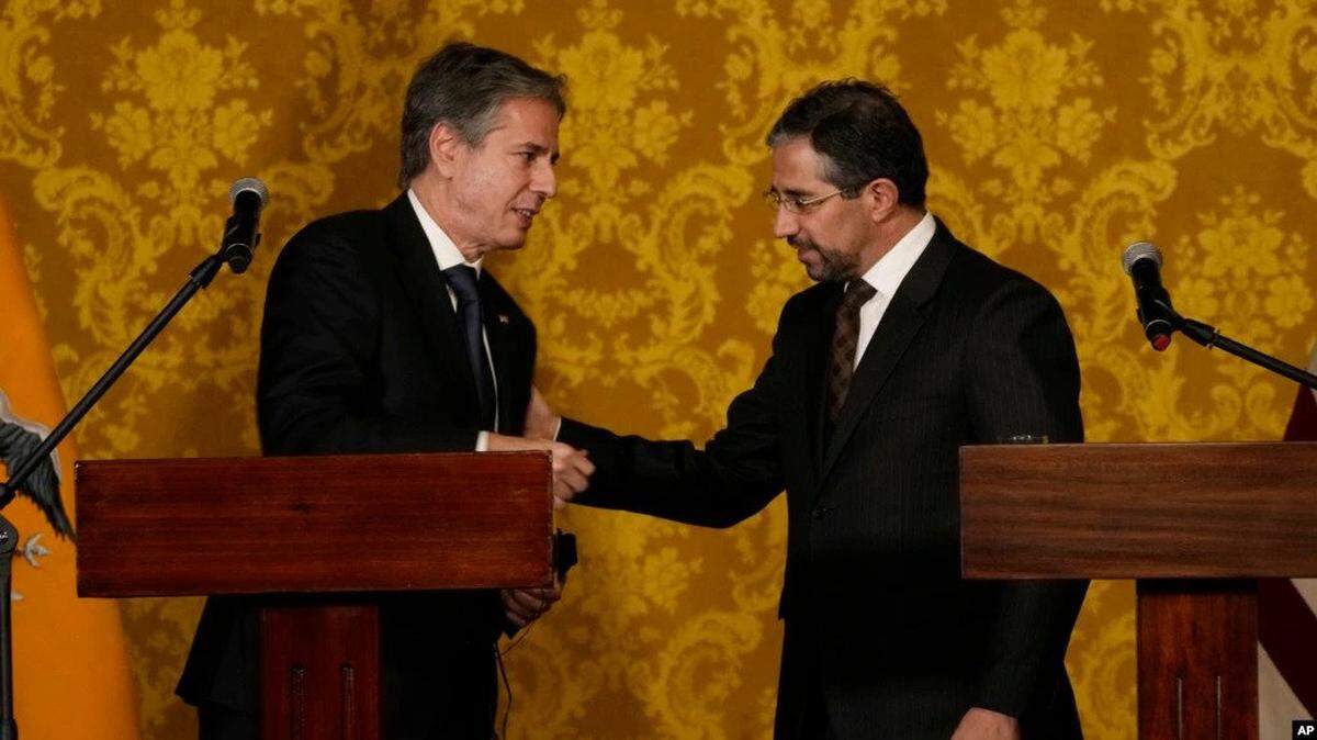 Secretary of State Antony Blinken, left, and Ecuador’s Foreign Minister Mauricio Montalvo, talk at the end of a press conference at government palace in Quito.