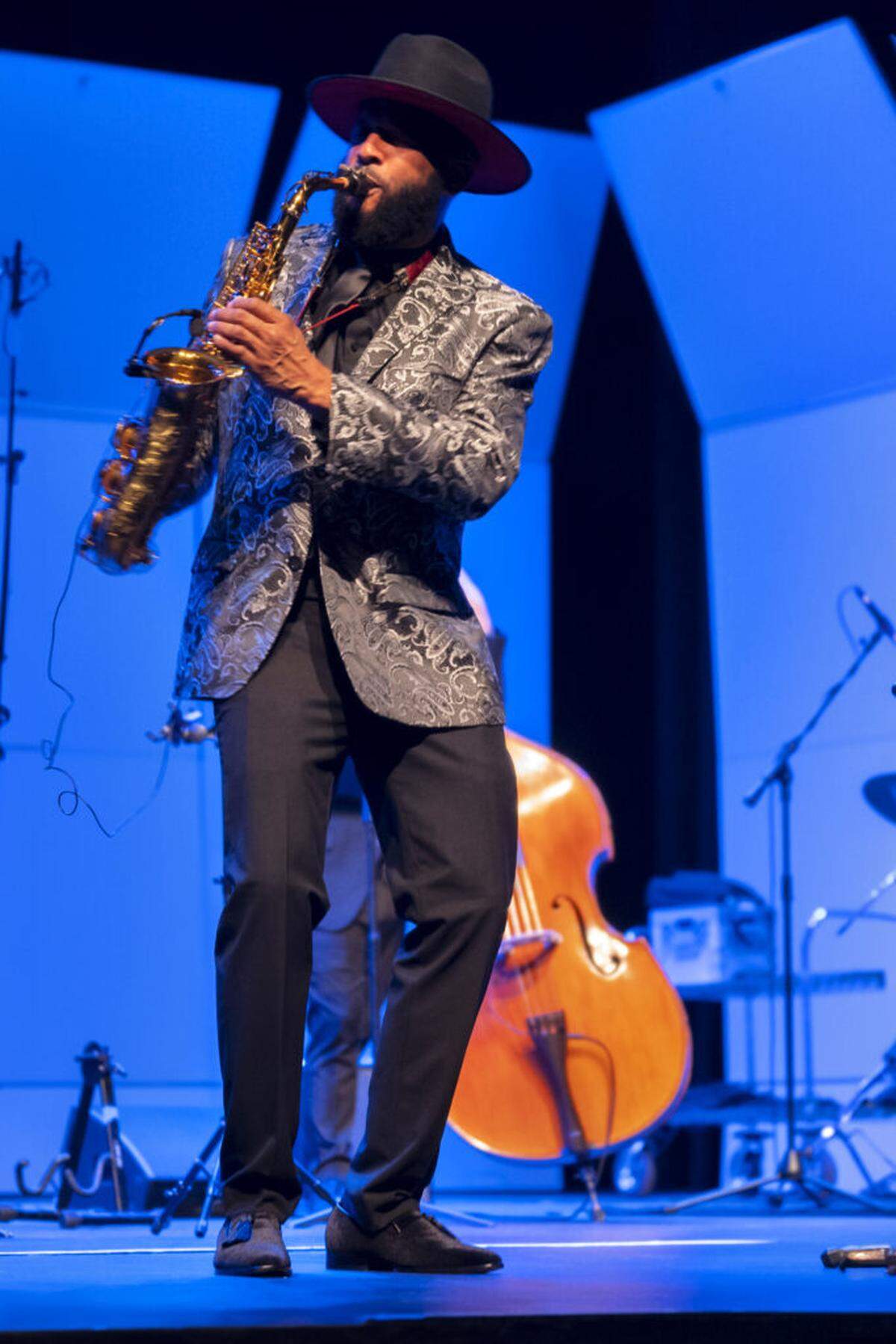 Melton Mustafa Jr. performs.