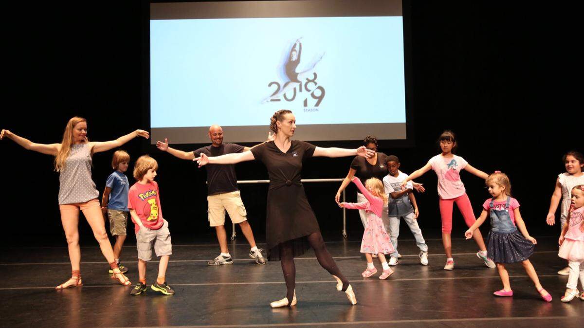 Callie Manning, principal soloist of Miami City Ballet, instructing a group of children at the ballet workshop held during ArtsLaunch on Sept 8 at Adrienne Arsht Center.