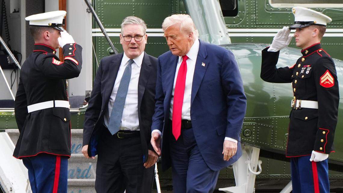 US President Donald Trump and Prime Minister Sir Keir Starmer arrive by helicopter at Trump International Golf Links, the president's Menie golf course in Aberdeenshire. The president is due to open up a new course dedicated to his Scottish mother, who grew up on the Isle of Lewis, as part of his five-day private trip to the country. Picture date: Monday July 28, 2025. 