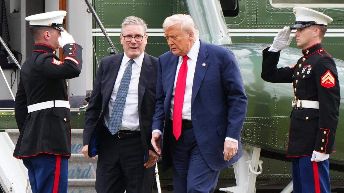 7/28/2025 - US President Donald Trump and Prime Minister Sir Keir Starmer arrive by helicopter at Trump International Golf Links, the president's Menie golf course in Aberdeenshire. The president is due to open up a new course dedicated to his Scottish mother, who grew up on the Isle of Lewis, as part of his five-day private trip to the country. Picture date: Monday July 28, 2025. (Photo by Jane Barlow/PA Images/Alamy Images/Sipa USA) *** US Rights Only ***