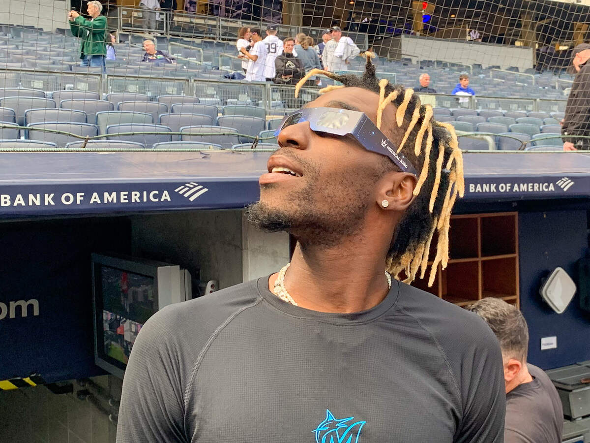 Miami Marlins outfielder Nick Gordon looks up to watch the solar eclipse on Monday, April 8, 2024, at Yankee Stadium.