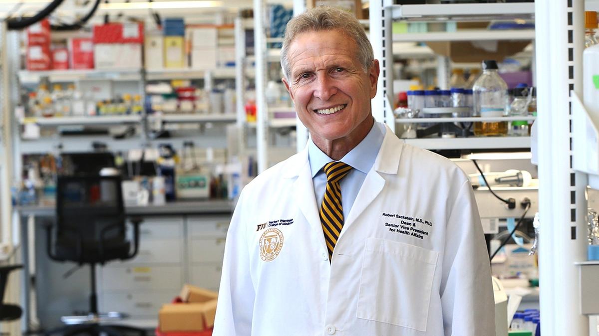 Dr. Robert Sackstein posed at the research lab. Dr. Sackstein is the new dean of the FIU College of Medicine. He came from Cuba when he was four years old, grew up a couple of miles south of campus and graduated from Southwest High School. He is the first Cuban-American dean of a U.S. medical school.  He is the son of Rosalina Sackstein a beloved UM music professor, who passed away a few years ago. Sackstein became interested in medicine after his cousin lost an eye to a congenital disease. A Silver Knight honorable mention in the science category, after high school Sackstein went off to Harvard, where he earned multiple degrees, including his M.D. and Ph.D. Sackstein is an expert in bone marrow transplantation, and an international authority in glycoscience, a field which concerns the role of sugars in biological systems., on Thursday, August 08, 2019.