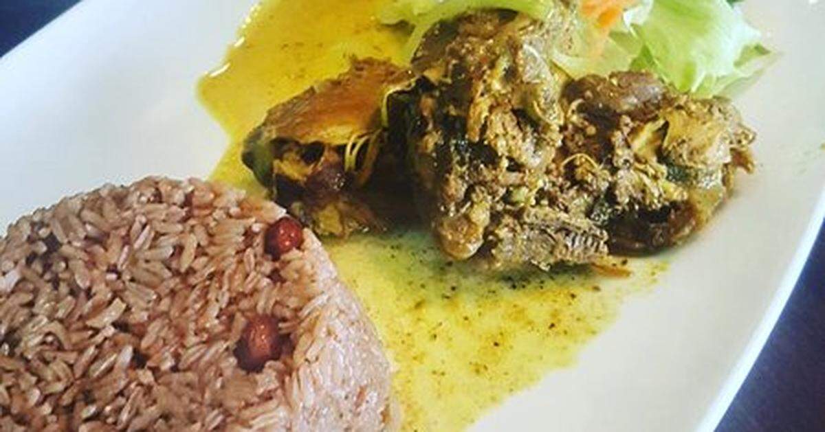 Rice and beans with curry goat at Yardie Spice.
