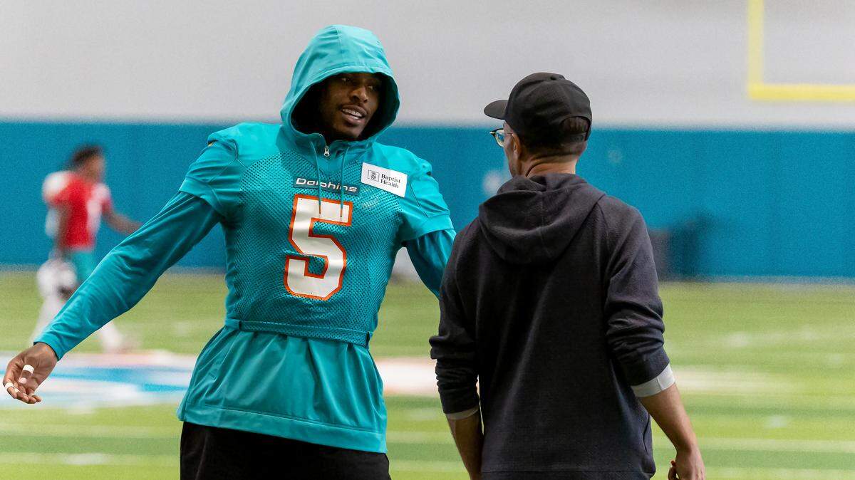 Miami Dolphins cornerback Jalen Ramsey (5) talks with Dolphins head coach Mike McDaniel during NFL mandatory minicamp at Baptist Health Training Complex in Hard Rock Stadium on Tuesday, June 4, 2024, in Miami Gardens, Fla.