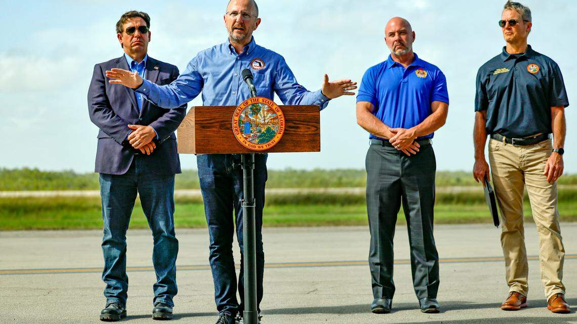 Florida Division of Emergency Management Director Kevin Guthrie speaks to reporters during a press conference on the airplane runway of Alligator Alcatraz in Ochopee , Florida on Friday, July 25, 2025. 