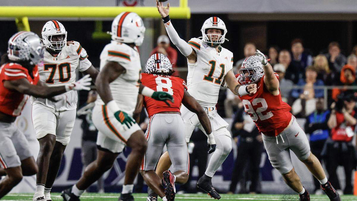 Miami Hurricanes quarterback Carson Beck (11) throws a pass during the second half of the College Football Playoff quarterfinal game against the Ohio State Buckeyes in the Cotton Bowl at AT&T Stadium in Arlington, Texas on Wednesday, December 31, 2025.