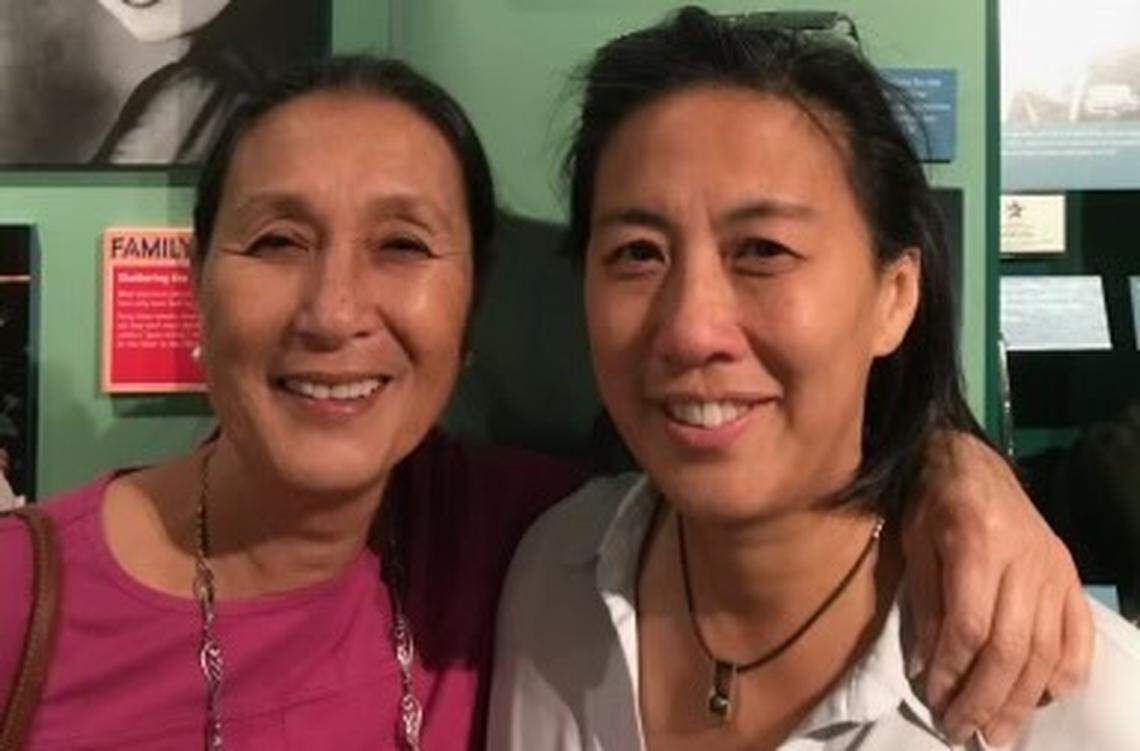 Virginia Cagar (left) and Miami Marlins general manager Kim Ng (right).