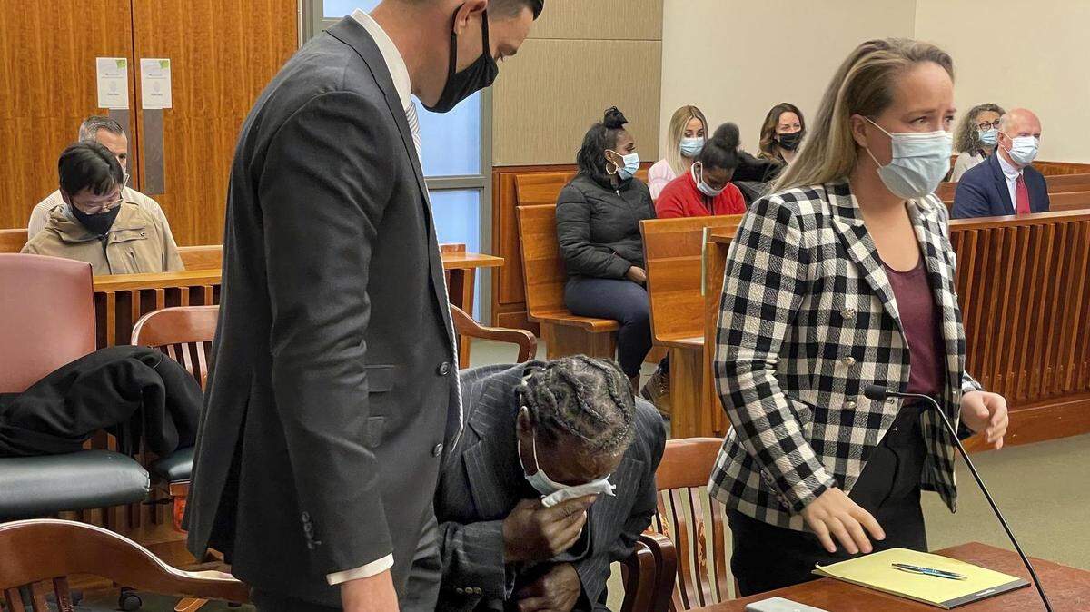 Anthony Broadwater, wrongly convicted in an author’s rape, breaks down as he is exonerated.