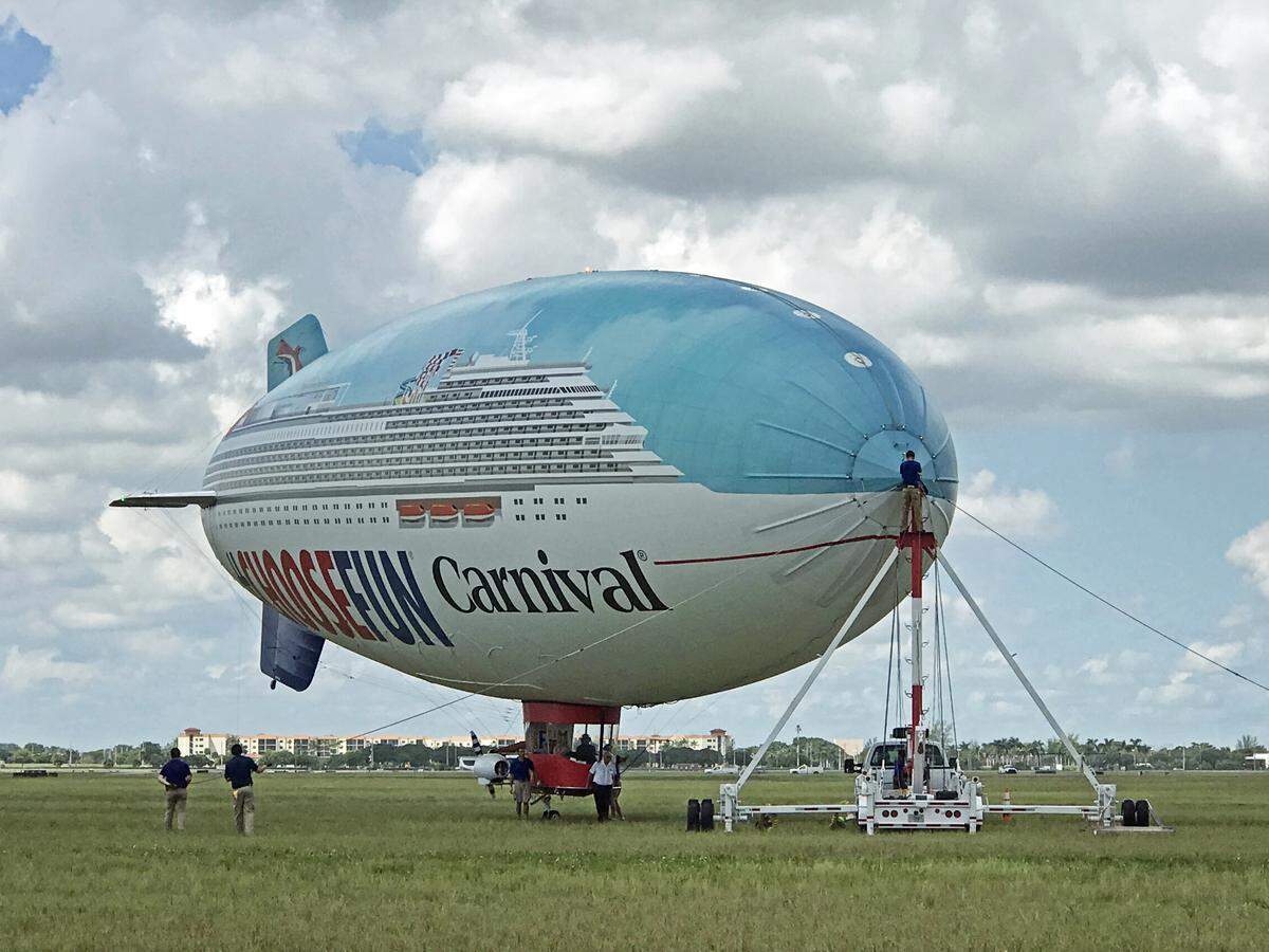At North Perry Airport in Pembroke Pines, crews prepare the Carnival AirShip for its next flight.