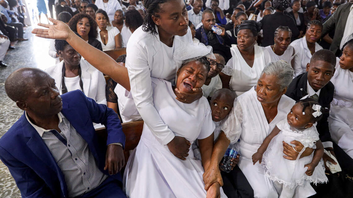 Foreign press attacked in Haiti while covering funeral for massacre victims