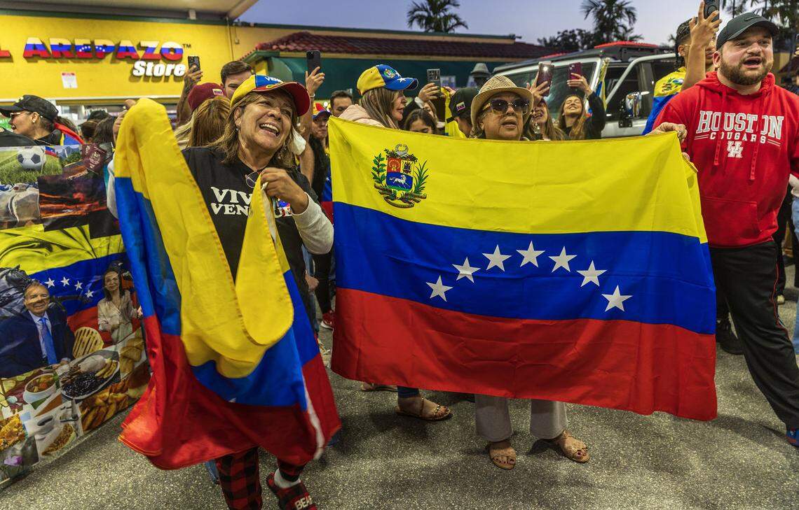 Esther Ojeda ( left) and Mirlene Gonzalez were among a group of Venezuelan exiles living in South Florida celebrating outside of El Arepazo in Doral, Florida, after the United States attacked Venezuela and captured Venezuelan leader Nicolás Maduro, on Jan. 3, 2026.