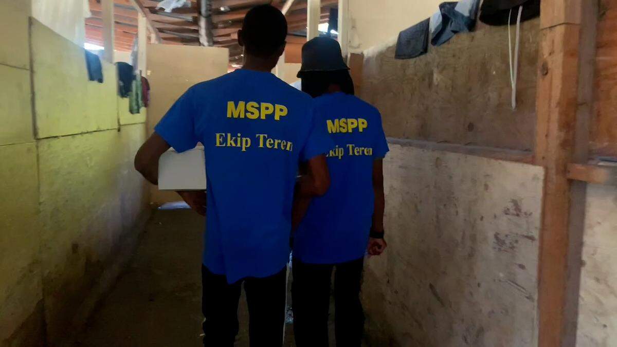 Health workers from Haiti’s Health Ministry visit the Lycée Marie Jeanne camp in Port-au-Prince on Friday, March 29, 2024 where at least 10 suspected cases of cholera have been recorded, according to the United Nations. Several suspected cases of cholera have started to emerge after the latest gang violence forced over thousands of new people to become homeless.