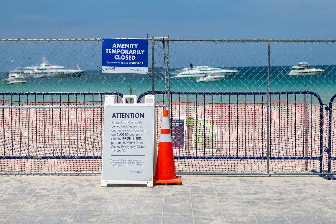 Access to South Beach is closed near South Pointe Park Pier on Saturday, July 4, 2020. Miami-Dade Mayor Carlos Gimenez ordered all beaches closed from Friday, July 3rd to Tuesday, July 7th in an effort to stop the rising spread of Covid-19 across the county.