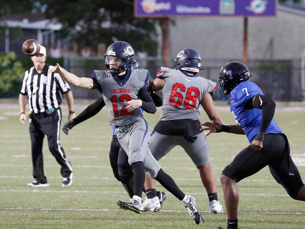 Columbus Explorers quarterback Jason Barket (12) throws a pass against South Dade Buccaneers during football game on Saturday, September 28, 2024 at Harris Field Park in Homestead. Andrew Uloza / for Miami Herald