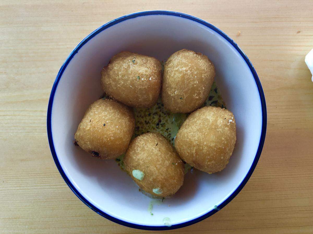 Yucca balls with green goddess sauce at Chug’s diner in Coconut Grove.