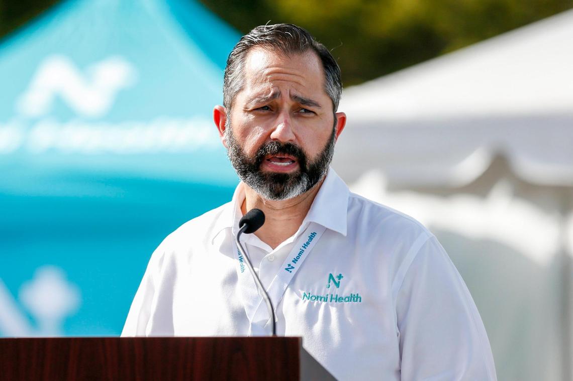 Nomi Health General Manager of Florida Hospitality & Travel Ron Goncalves speaks about how Nomi is preparing to meet the increased demand for testing and vaccination as a consequence of the new COVID-19 variant, omicron, during a press conference at Tropical Park in Miami, Florida, on Thursday, Dec. 16, 2021.