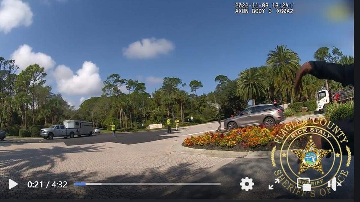 A Florida man was accused of intentionally driving his Porsche into a worker directing traffic when the worker tried to stop him from entering a lane, according to authorities/FCSO
