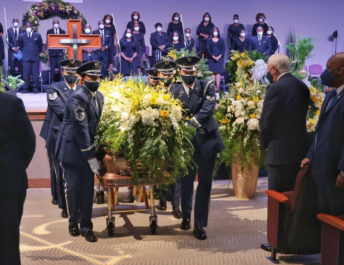The casket of Carrie P. Meek is escorted by pallbearers at the end of the funeral service at the Antioch Missionary Baptist Church on Tuesday, Dec. 7, 2021.