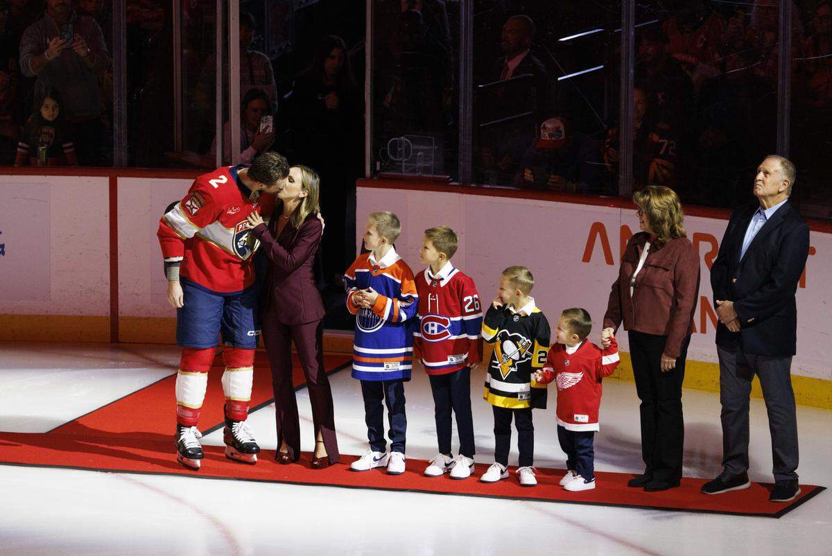 Florida Panthers defenseman Jeff Petry (2) celebrates 1000 games with his family before the first period of a game against the New Jersey Devils on Thursday, Nov. 20, 2025, at Amerant Bank Arena in Sunrise, Fla.