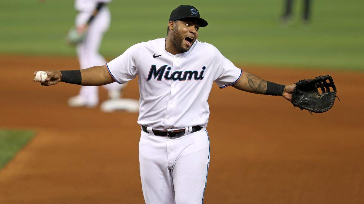 Miami Marlins first baseman Jesus Aguilar (24) reacts during the seventh inning of their baseball game against the Washington Nationals at loanDepot park on Wednesday, August 25, 2021 in Miami, Florida.