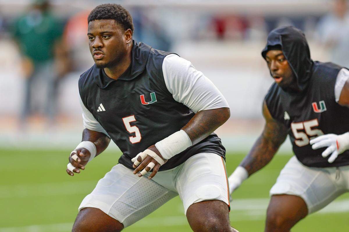 Miami Hurricanes wide receiver Ray Ray Joseph (5) runs through warm up drills before the NCAA football game against the Syracuse Orange at Hard Rock Stadium in Miami Gardens, Florida on Saturday, November 8, 2025.