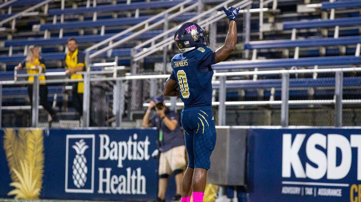 Florida International University wide reciever Tyrese Chambers (0) reacts to scoring a touchdown during the fourth quarter of an NCAA Conference USA football game against University of North Carolina at Charlotte 49ers at Riccardo Silva Stadium in Miami, Florida, on Friday, October 8, 2021.