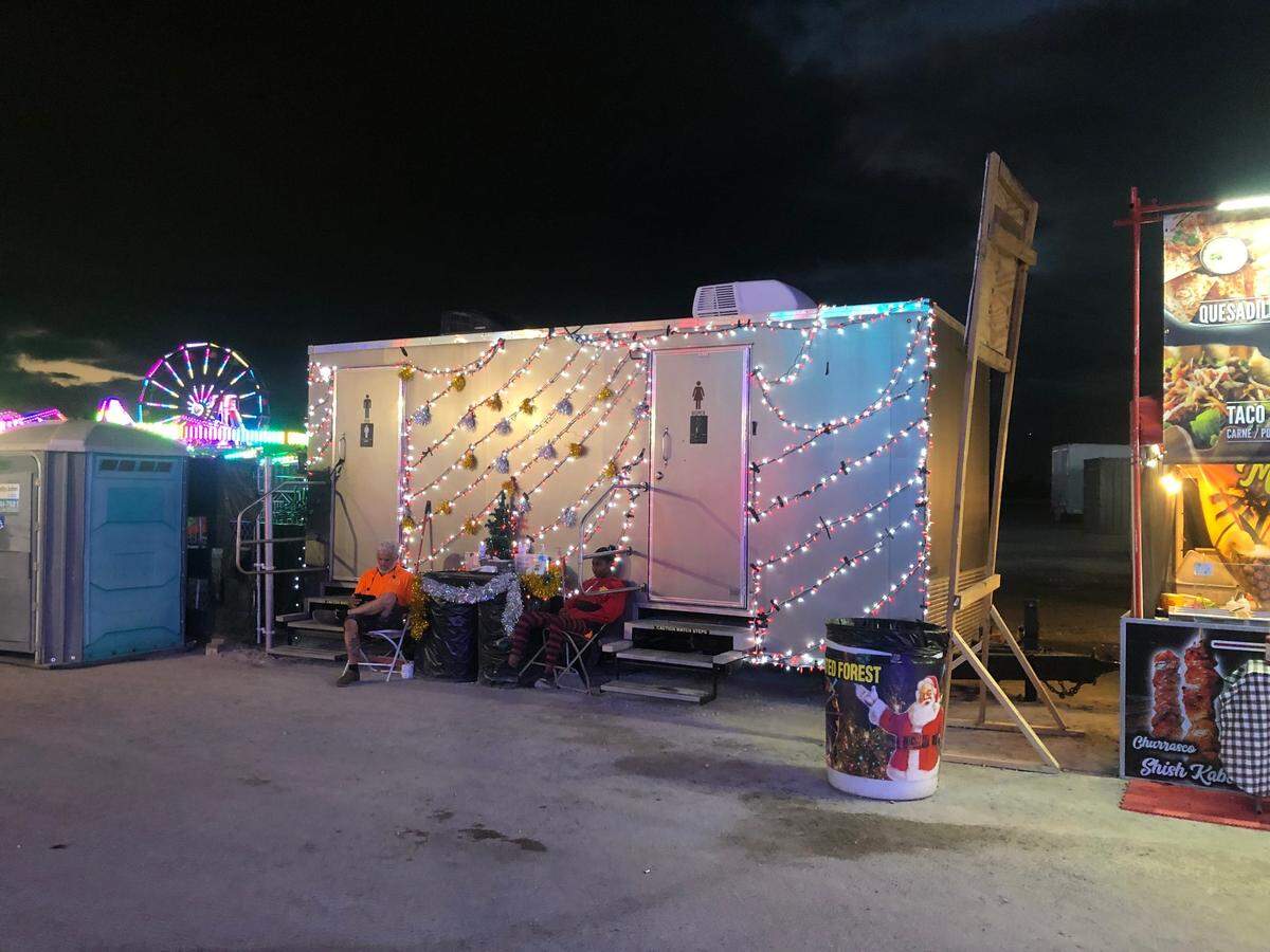 Behold, the world’s most festive port-A-potties.