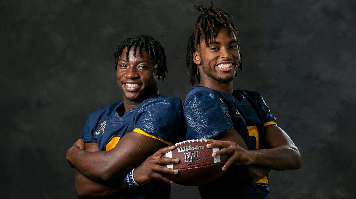 King Mack, left, and Conrad Hussey, safeties from St.Thomas Aquinas High School, are photographed during High School Media Day at Pompano Beach High School on Tuesday, Aug. 2, 2022, in Pompano Beach, Fla.