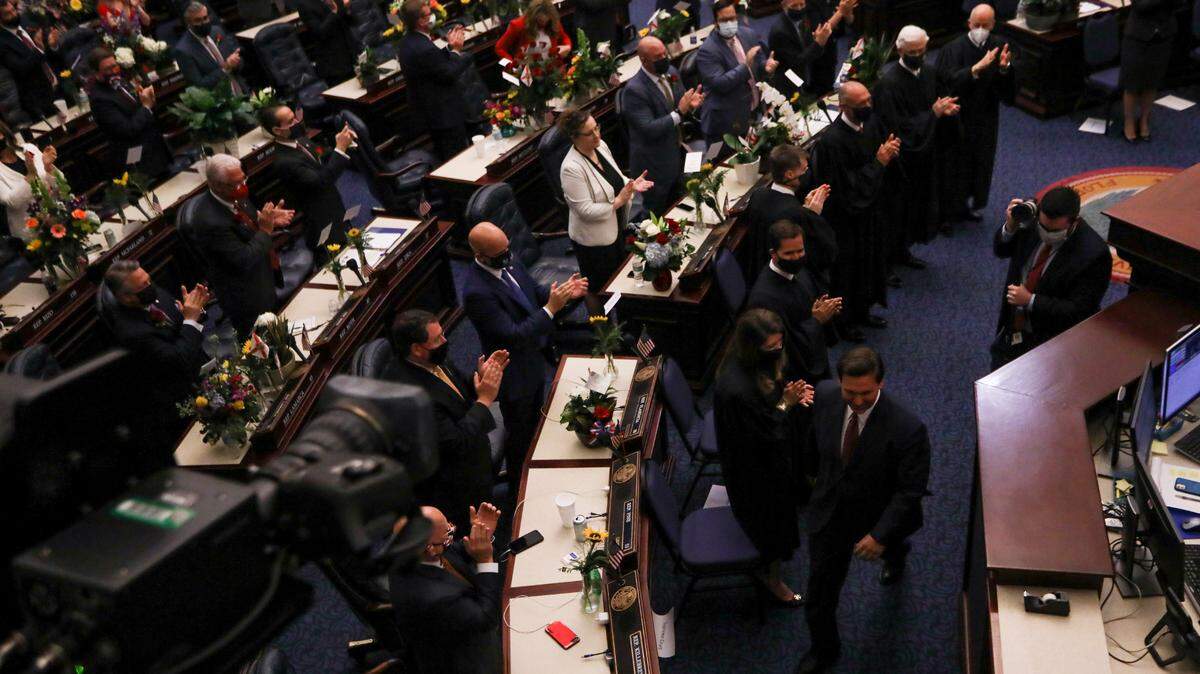 VoteWater.org’s newly published Dirty Money Project tracked donations from polluting industries to Florida politicians. Here, Florida legislators gather at the Capitol to listen Gov. Ron DeSantis speak.