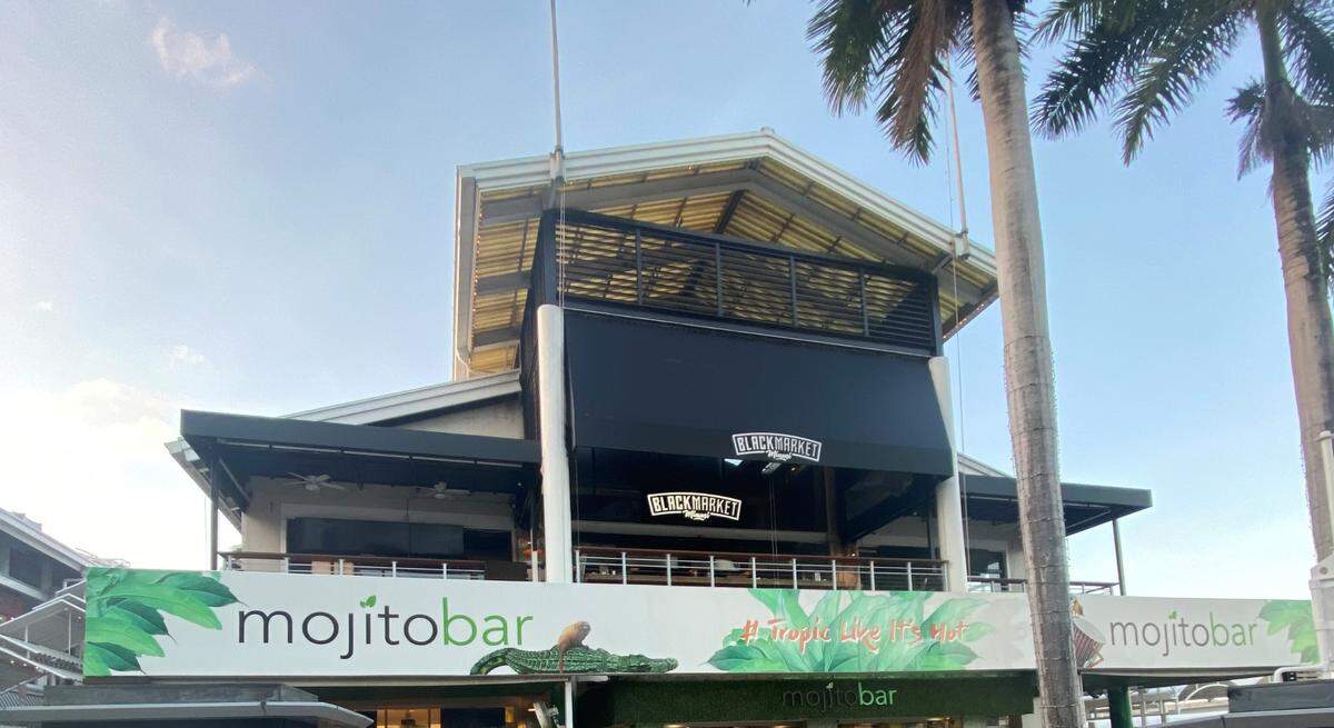 Black Market Miami signs have replaced the Hooters signs at Bayside Marketplace.