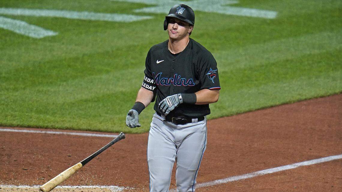 Miami Marlins’ JJ Bleday tosses his bat after being walked by Pittsburgh Pirates relief pitcher David Bednar during the ninth inning of a baseball game in Pittsburgh, Saturday, July 23, 2022. It was Bleday’s first major league at-bat. (AP Photo/Gene J. Puskar)