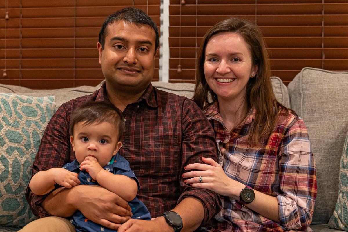 ‘People can’t afford to live here. It’s not just those who we think of coming from a lower income. It’s the college educated who can’t make it work,’ says Tanjim Hossain, pictured above with his son Ambrose and wife Christine Oliver.
