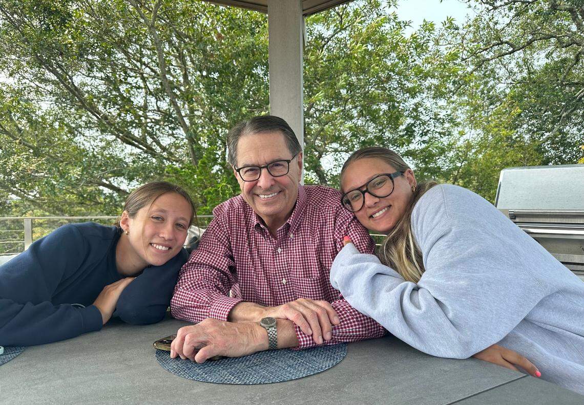 Dr. Michael Zinner with his granddaughters Alexandra Herman (left) and Ashley Herman (right) in a family photo.