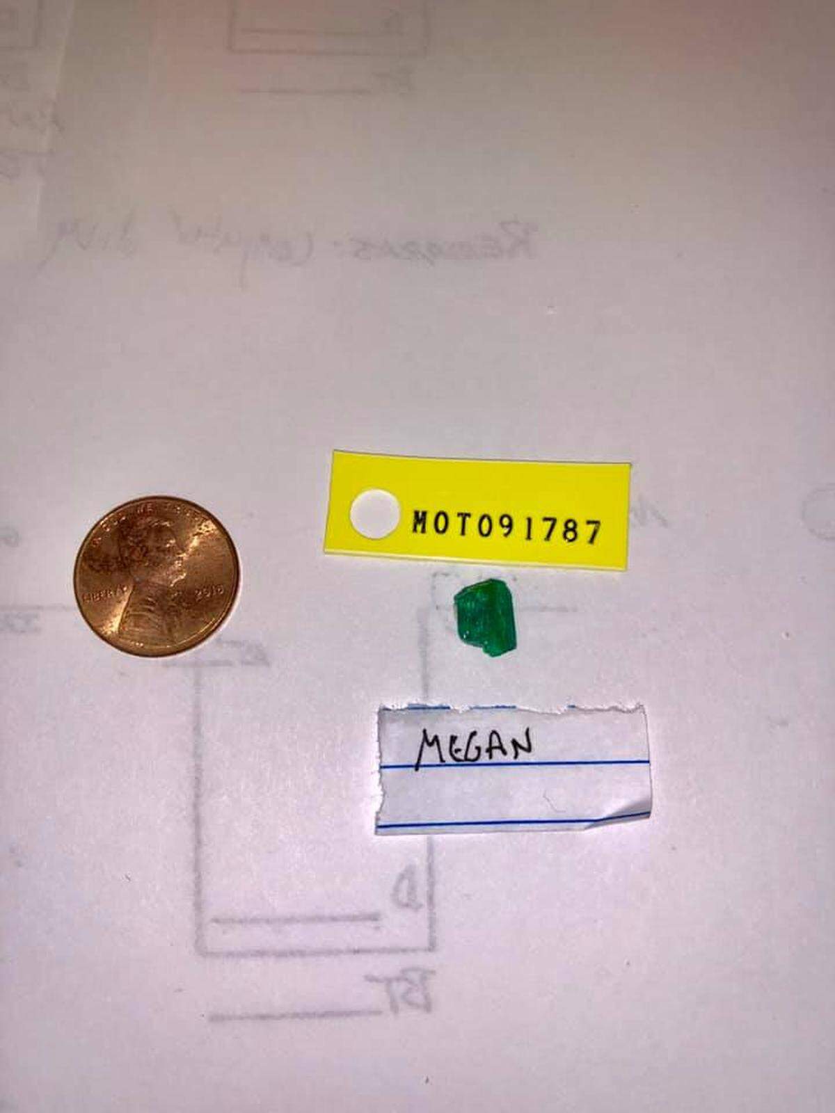 The emerald, which hasn’t yet been valued, was about two carats.