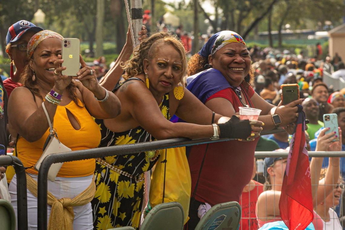 People watch performers cross the stage during Miami Carnival at the Miami-Dade County Fair Expo in Miami, Florida on Sunday, October 9, 2022.