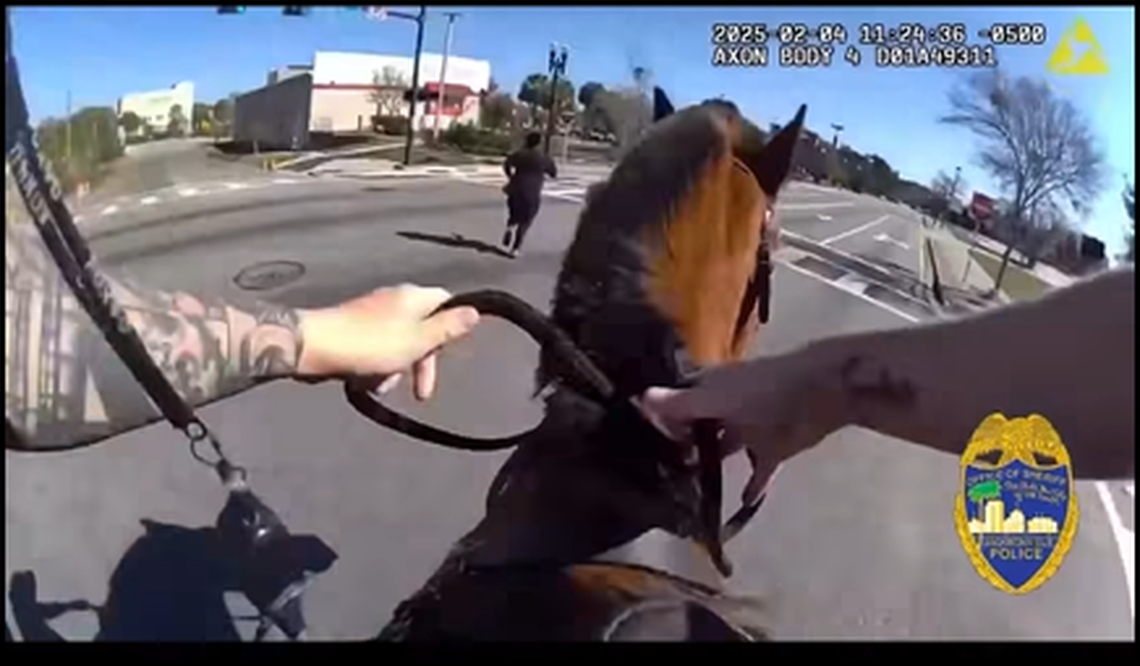 Body cam video shows the 25-year-old man tried to shake the horse by running directly into traffic, nearly getting hit at one point.