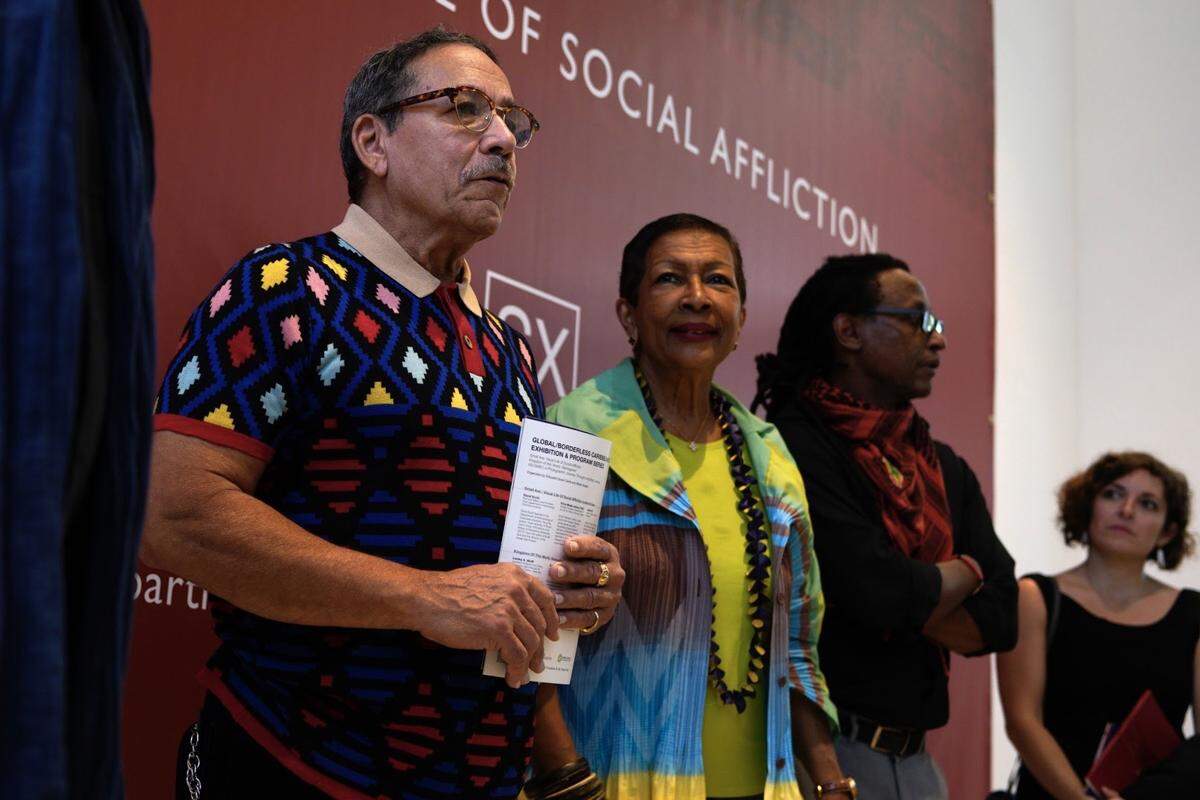 Edouard Duval-Carrie, left, leads the Haitian Cultural Arts Alliance.