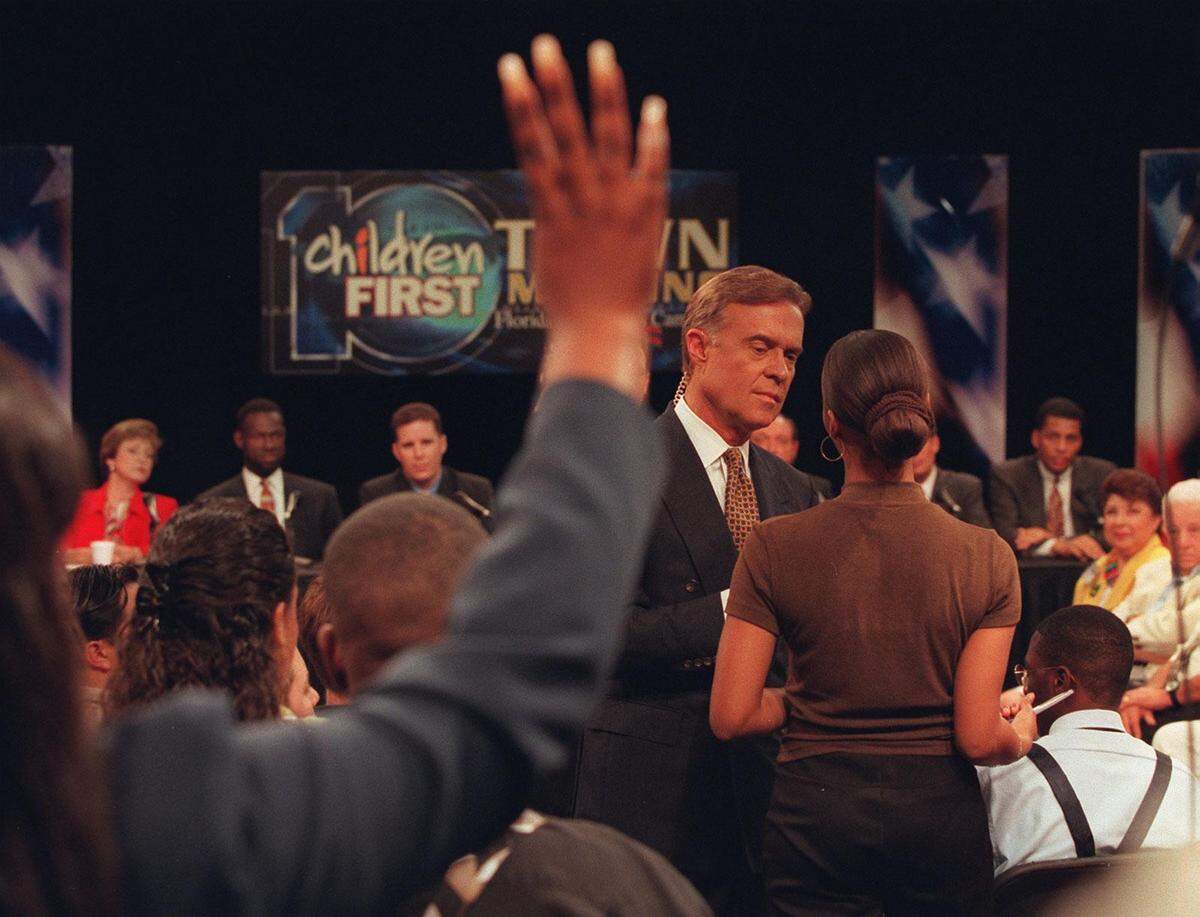 In this file photo from March 15, 1997, Michael Putney moderated a meeting with Florida legislators that featured students from Miami-Dade schools.