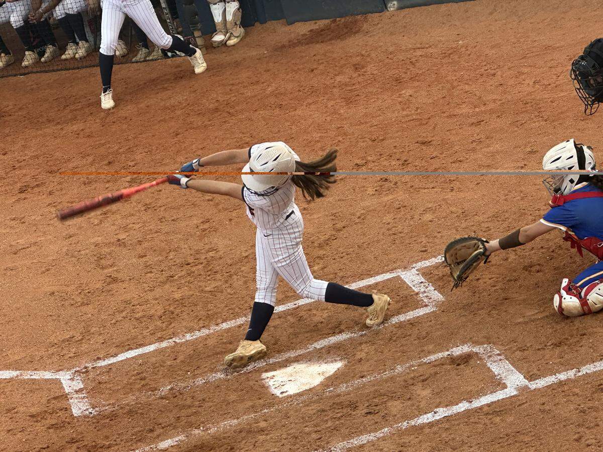 Florida Christian’s Kianny Gil swings the bat during Wednesday’s Region 4-2A softball quarterfinal against West Palm Beach Cardinal Newman.
