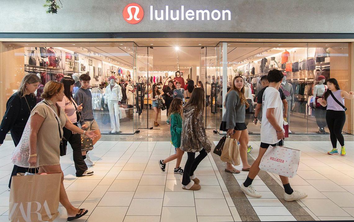 Black Friday shoppers on the move at Dadeland Mall near Lululemon look for bargains on Friday, Nov. 29, 2024.
