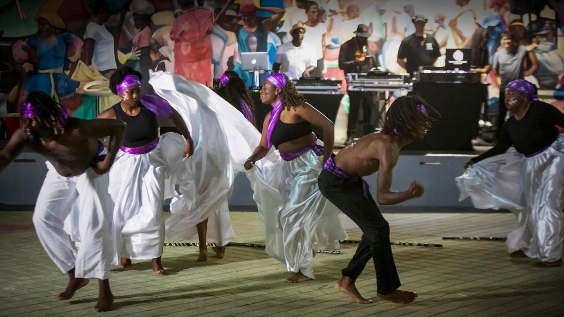 Members of the NSL Danse Ensemble perform in honor of Fèt Gede, the Haitian Day of Dead, at the Little Haiti Cultural Complex.